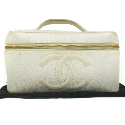 chanel tiny white makeup bag